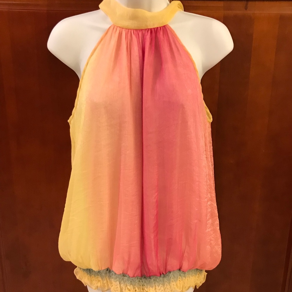 Multi-colored sleeveless blouse.